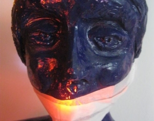 l'opera di Guadagnuolo, Il volto della paura ispirata al Coronavirus